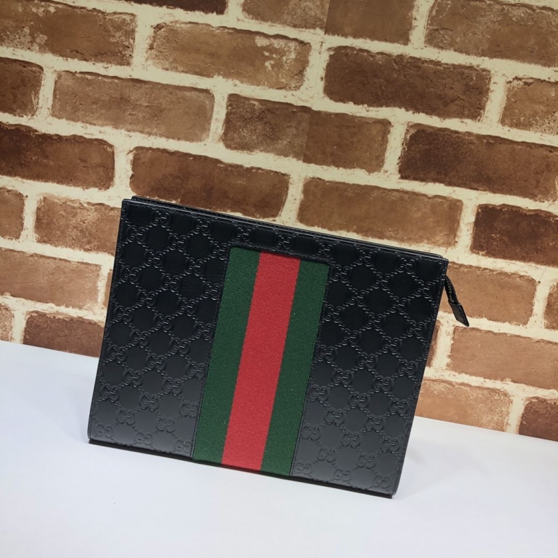 G*u*i clutch bags